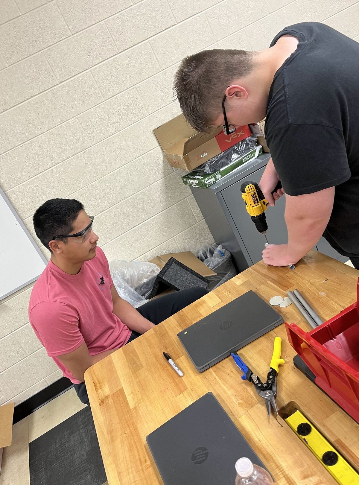 Students working hands-on in makerspace