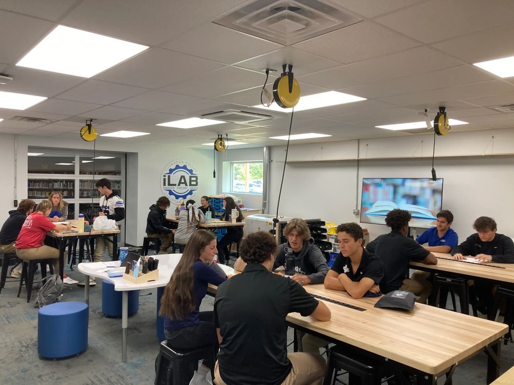 Students collaborating in CVCA iLab makerspace